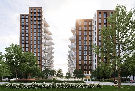 À terme, deux tours d'habitation à structure en bois massif de grande hauteur, avec une performance environnementale qui se veut exemplaire, seront construites à Terrebonne. Crédit : Provencher_Roy
