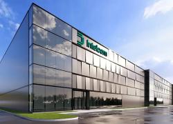 L'entreprise de livraison construira un nouveau centre de tri automatisé visant à la fois les certifications LEED et BCZ-Design sur la Rive-Sud de Montréal. Crédit : Intelcom
