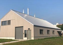 Le complexe Maison Mère de Baie-Saint-Paul est dorénavant alimenté à la biomasse. Crédit : Ville de Baie-Saint-Paul.